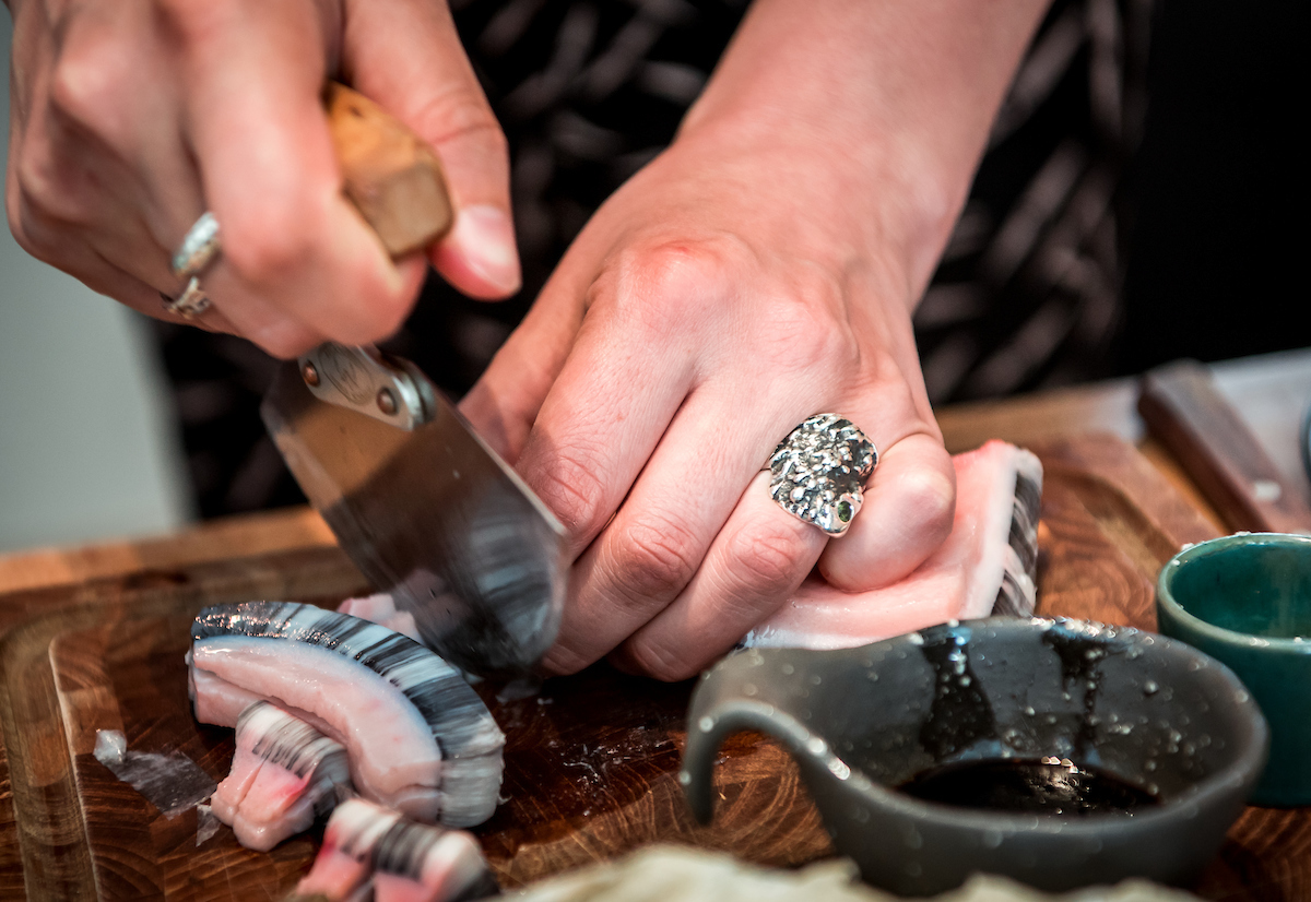 Cutting Mattak With An Ulu. Photo Lola A. Åkerström, Visit Greenland (1)