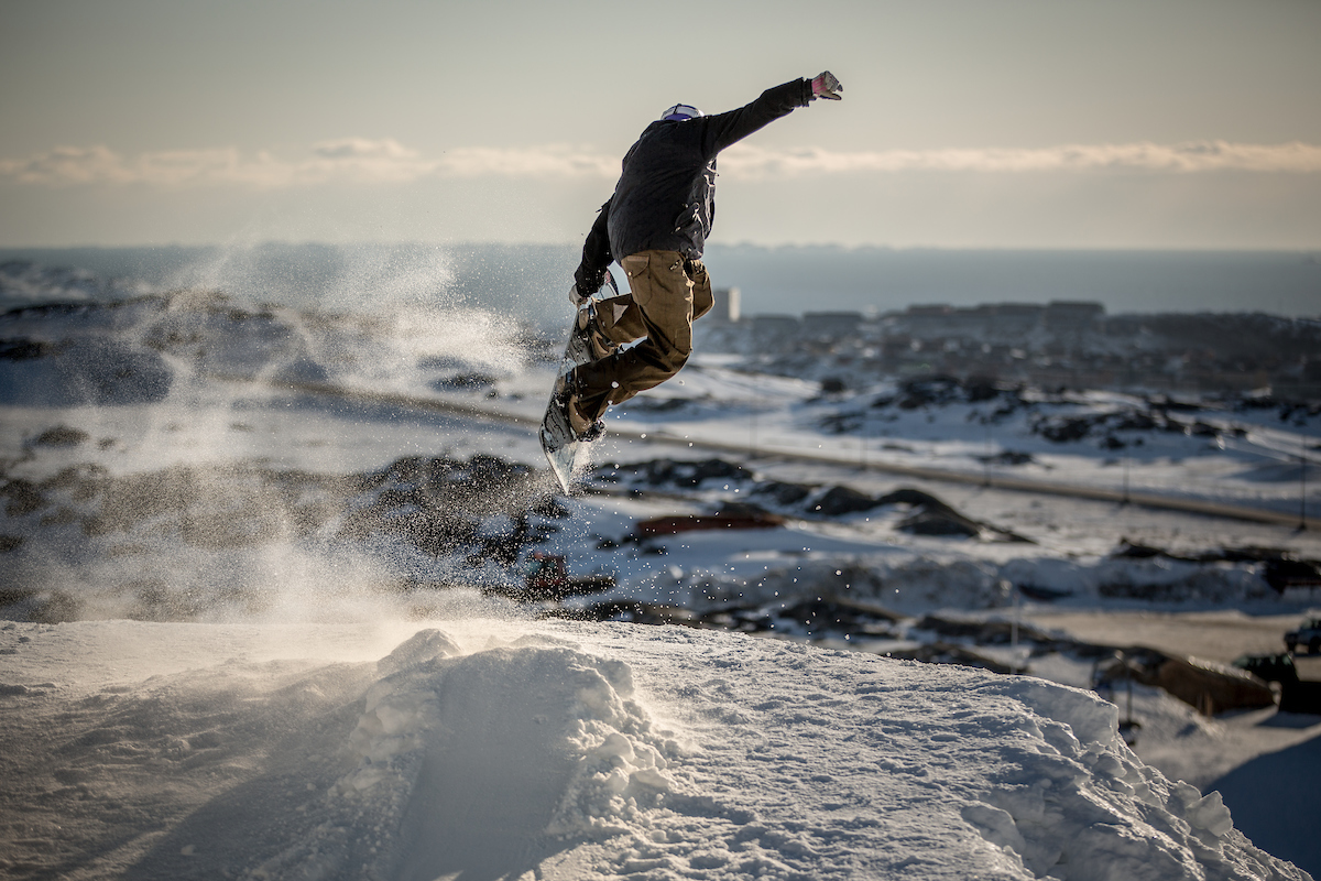 A Snowboarder In Nuuk Practicing For The Arctic Winter Games In Greenland