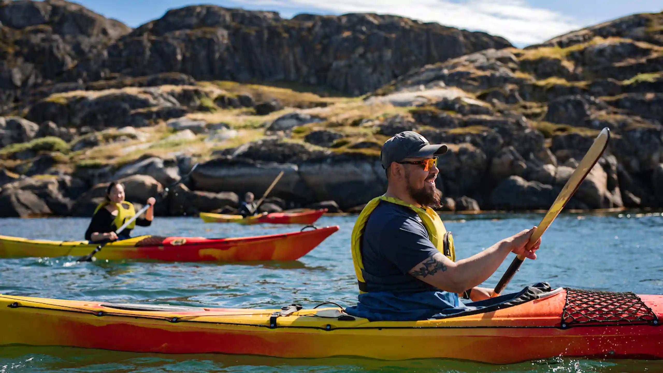 Group Of Kayakers On Tour Neat Sisimiut. Photo Aningaaq R. Carlsen, Visit Greenland