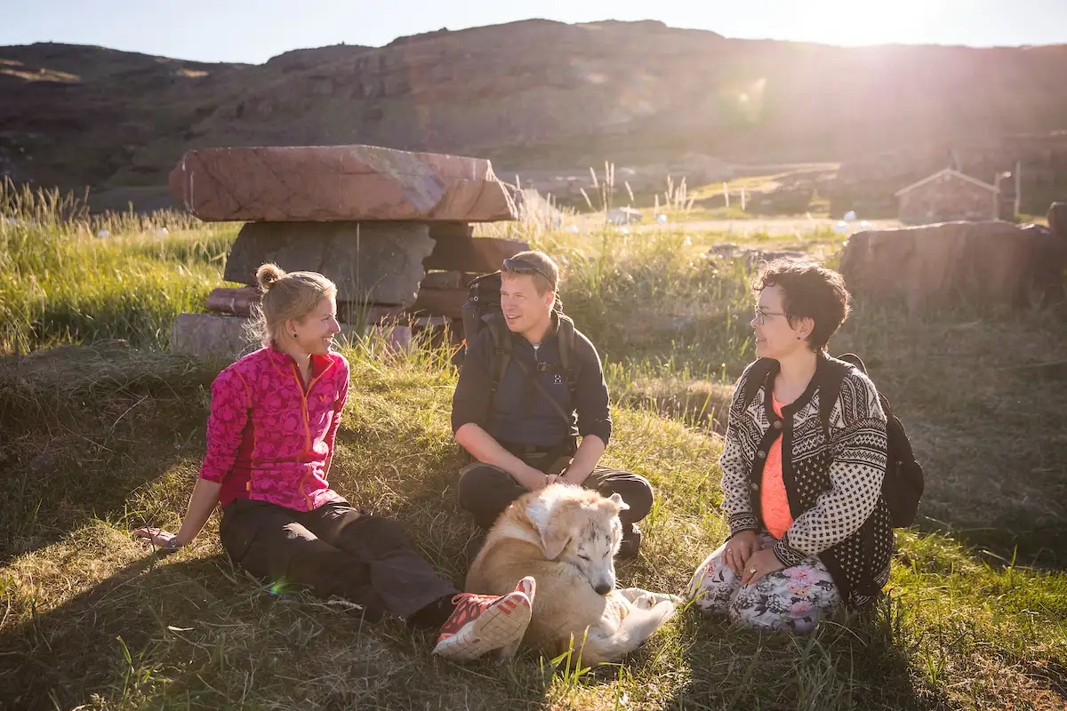 A Group Of Travelers At The Norse Ruins In Igaliku In South Greenland